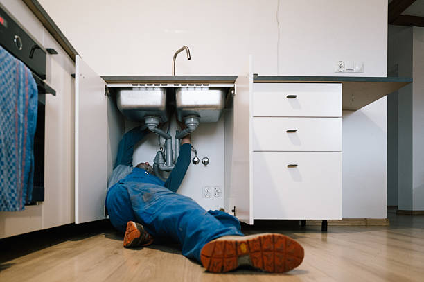 Professional Drain Cleaning technician working in Oakland Gardens, NY
